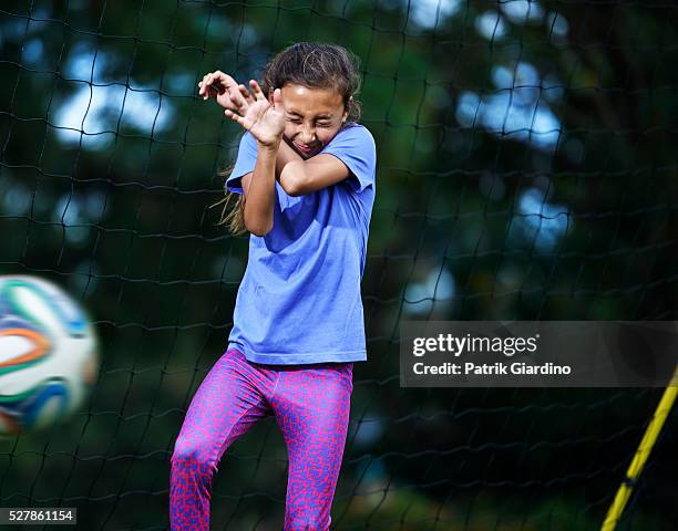 kids playing soccer - bad goalkeeper stock pictures, royalty-free photos & images