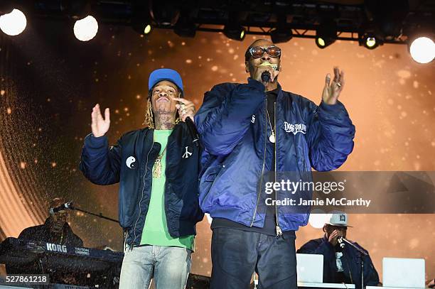 Wiz Khalifa and Snoop Dog perform onstage at the AOL NewFront 2016 at Seaport District NYC on May 3, 2016 in New York City.