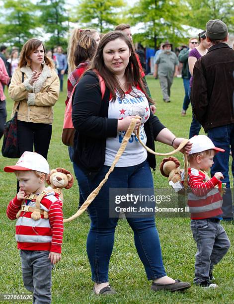 Supporters for Democratic presidential candidate Bernie Sanders wait for their candidate to arrive for to a campaign rally at the Big Four Lawn park...