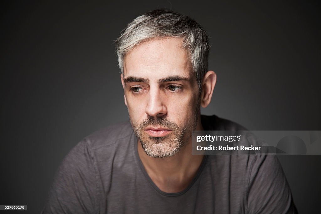 Melancholic middle-aged man