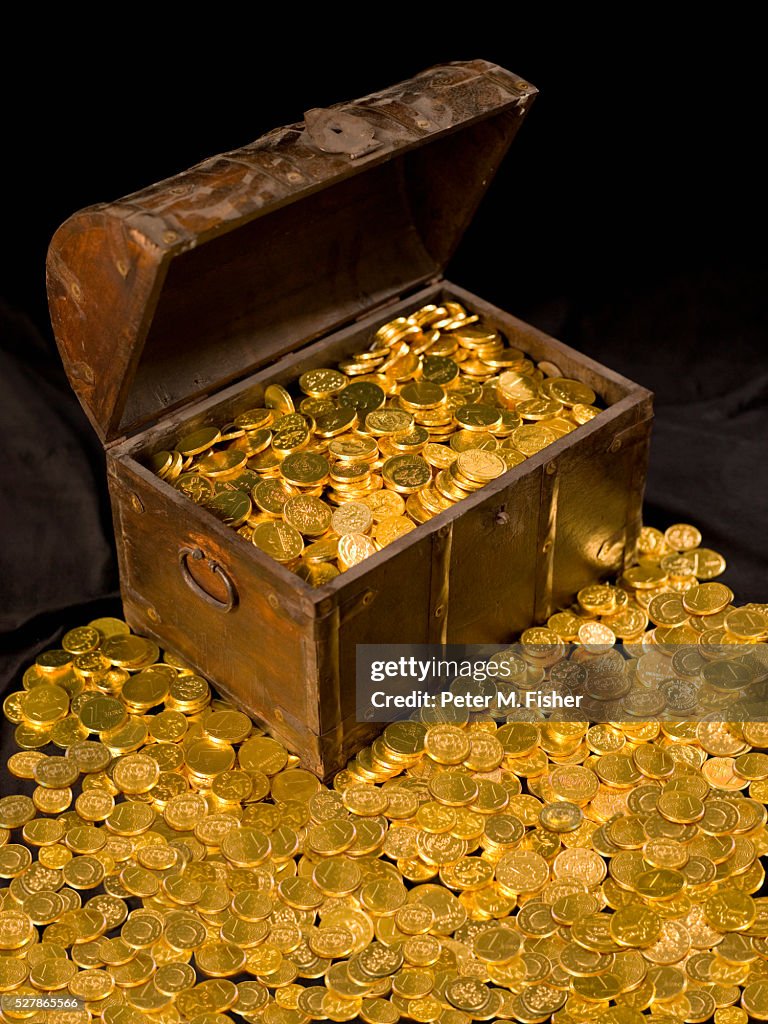 Treasure Chest Full Of Gold High-Res Stock Photo - Getty Images