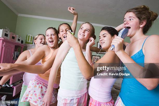 teenage girls at a slumber party - girls sleepover stock-fotos und bilder