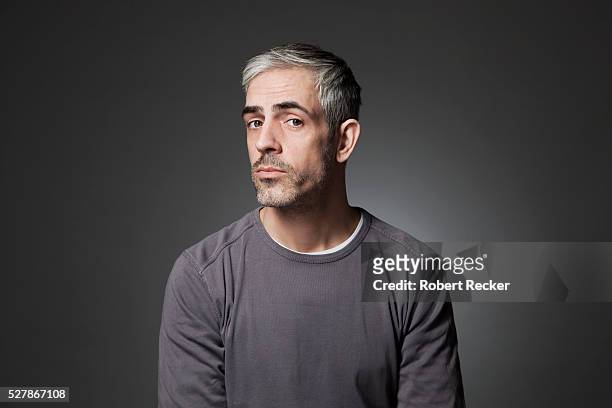 studio shot of man with graying hair - man studio shot stock pictures, royalty-free photos & images