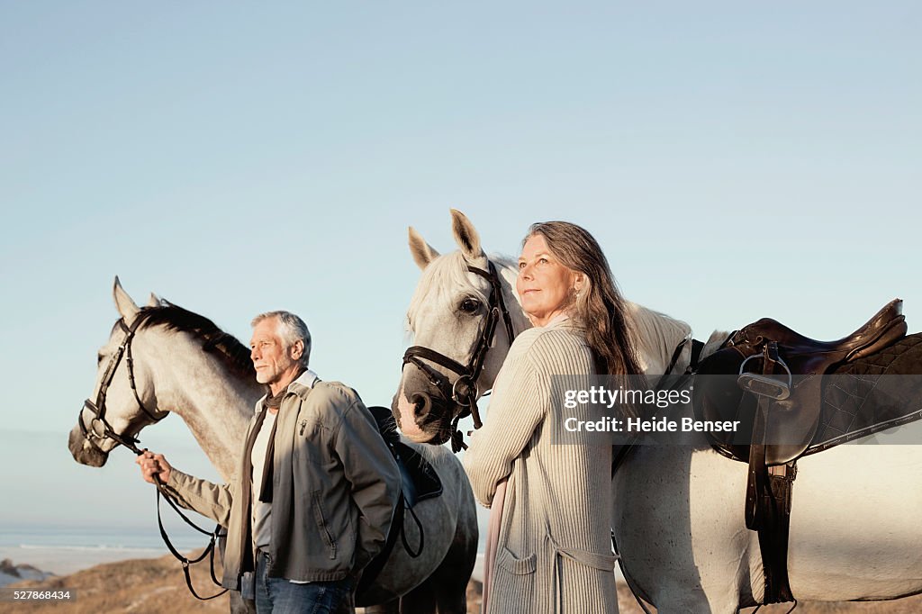 Couple horseback riding