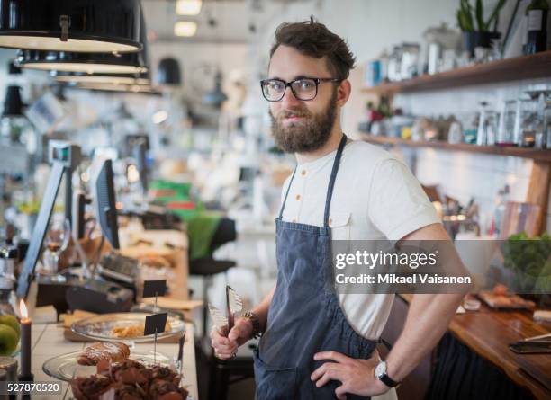 coffee shop owner behind counter - white apron stock pictures, royalty-free photos & images