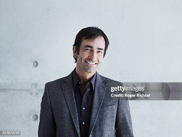 portrait of smiling man - gray jacket stock pictures, royalty-free photos & images