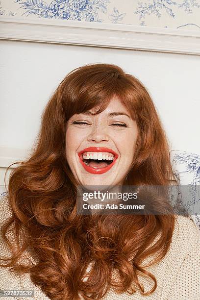 laughing young woman - freckle stock pictures, royalty-free photos & images