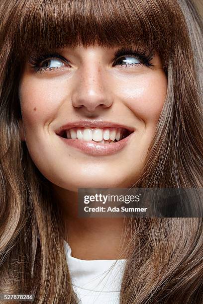 closeup smiling young woman - fringe stock-fotos und bilder