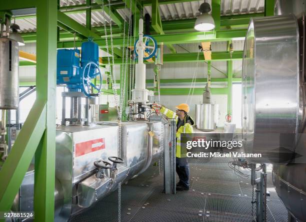 technician on modern power station construction site - shale stock pictures, royalty-free photos & images