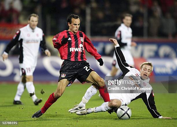 Fussball : 1. Bundesliga 04/05, Leverkusen, 13.02.05;Bayer 04 Leverkusen - FSV Mainz 05;Landon DONOVAN/Bayer, Michael THURK/Mainz