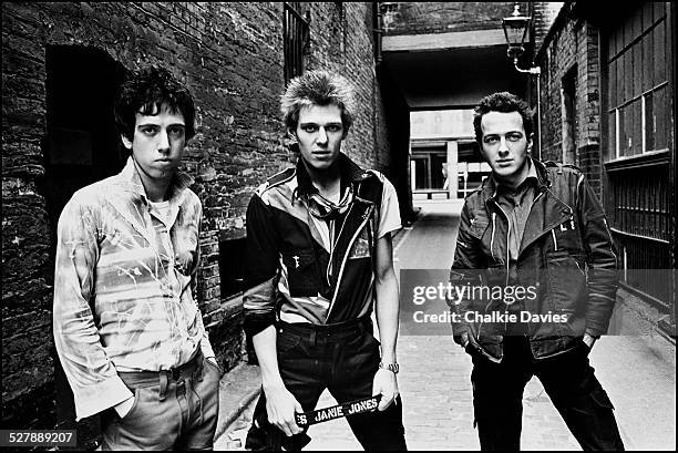 British punk group The Clash in an alleyway in Central London, April 1977. Left to right: guitarist Mick Jones, bassist Paul Simonon and singer Joe...