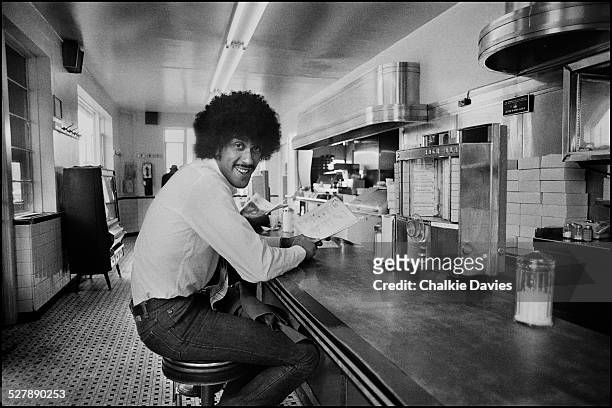 Irish singer and musician Phil Lynott , of rock group Thin Lizzy, at a diner in Philadelphia, Pennsylvania, 1978.