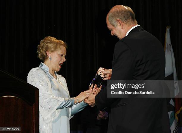 Zina Bethune accepting the award from Craig Moon