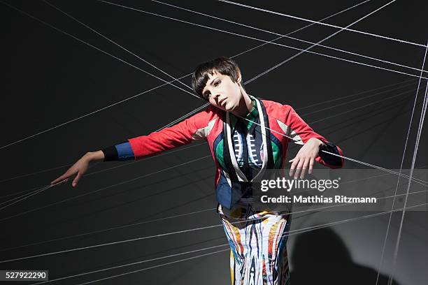 String Thread Hanging 114 Woman Hanging On By Thread Stock Photos, High-Res Pictures, and ...