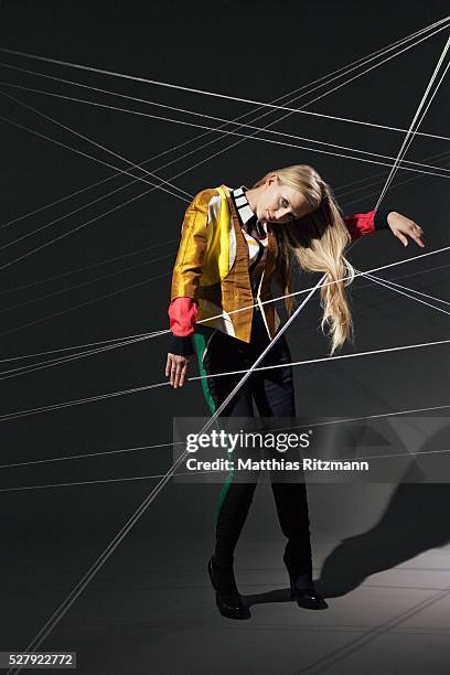 String Thread Hanging 114 Woman Hanging On By Thread Stock Photos, High-Res Pictures, and ...