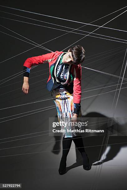 String Thread Hanging 73 Woman Hanging On By Thread Stock Photos, High-Res Pictures, and ...