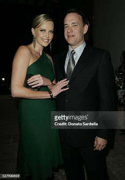 Charlize Theron an Tom Hanks during Gucci Spring 2006 Fashion Show to Benefit Children's Action Network and Westside Children's Center - Inside at...