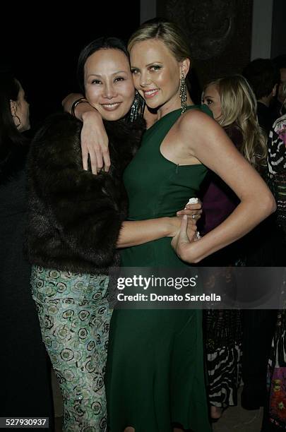 Eva Chow and Charlize Theron during Gucci Spring 2006 Fashion Show to Benefit Children's Action Network and Westside Children's Center - Inside at...