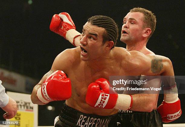 Boxen: IBF und WBA Weltmeisterschaft Supermittelgewicht, Nuernberg, 13.12.03, Robin REID/ENG - Sven OTTKE/GER, Robin REID/ENG, Sven OTTKE/GER