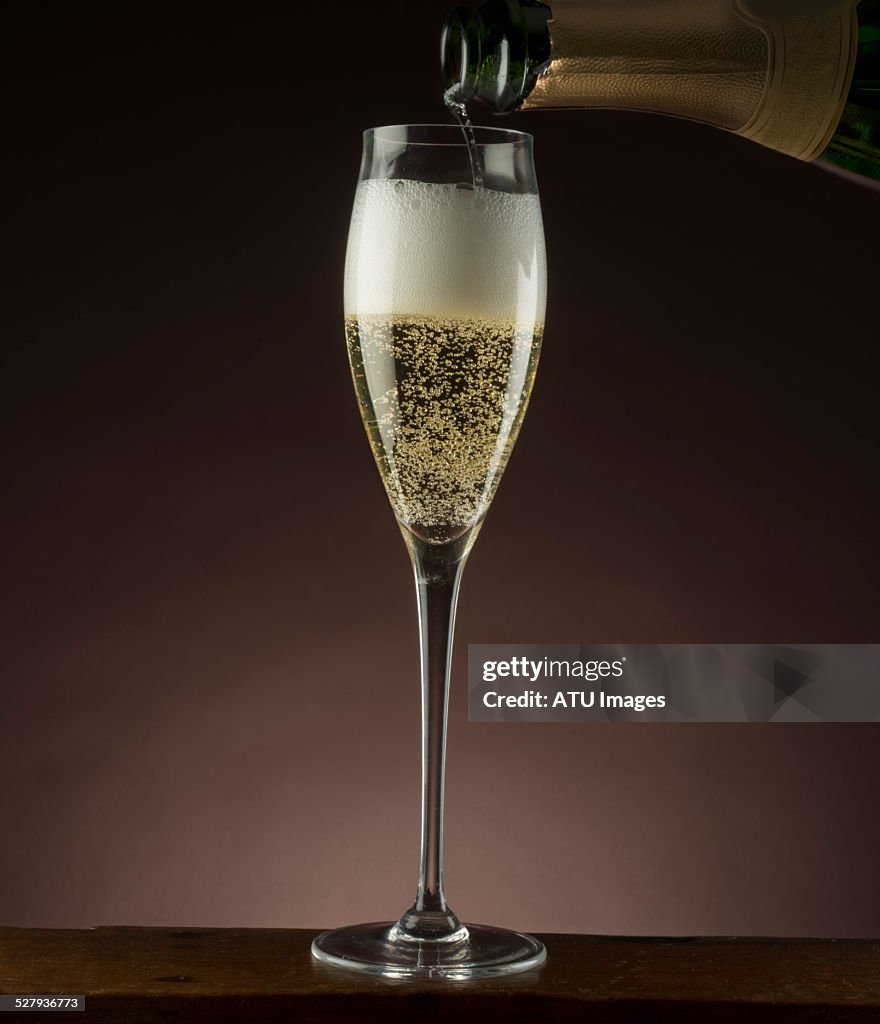 Champagne poured from bottle