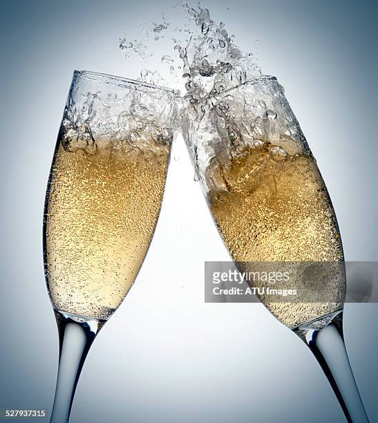 champagne toasting splashing - champagne stock pictures, royalty-free photos & images