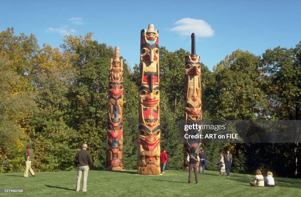 Trio of Totem Poles by Robert Davidson