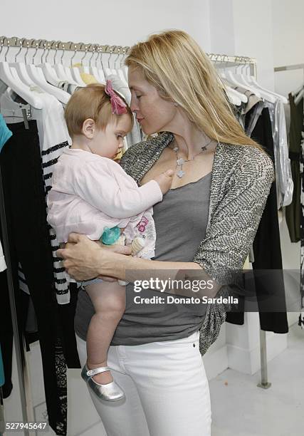 Actress Kelly Rutherford in Alice + Olivia with daughter Helena attend Alice + Olivia Tea Party Benefitting Children's Defense Fund on May 23, 2010...