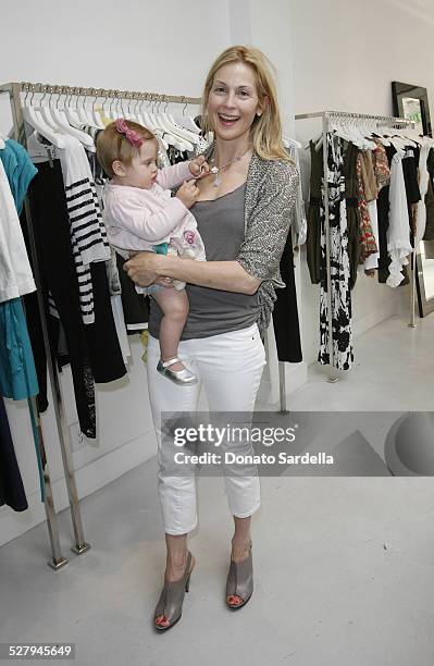 Actress Kelly Rutherford in Alice + Olivia with daughter Helena attend Alice + Olivia Tea Party Benefitting Children's Defense Fund on May 23, 2010...