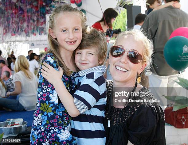 Julie Jaffe and kids attend the Cindy Carwford & Rende Berger host the John Varvatos 6th Annual Stuart House Benefit presented by Converse March 9,...