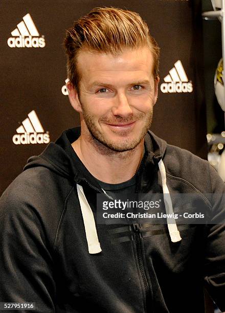 S David Beckham and Zinedine Zidane at Adidas store, Champs Elysees Avenue in Paris, France on February 28, 2013. Photo by Thierry...