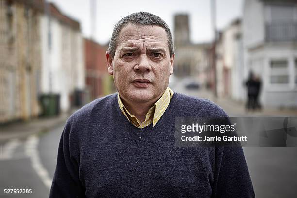 middle-aged man stood in the street - collar stock pictures, royalty-free photos & images