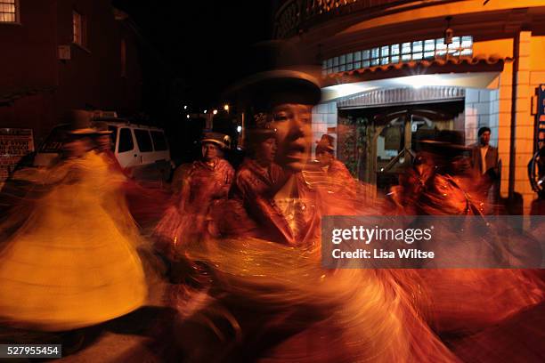 Virgen del la Candelaria Aymaran women dance into the night during the Fiesta de la Virgen de la Candelaria is held to honour the Virgen or the Dark...