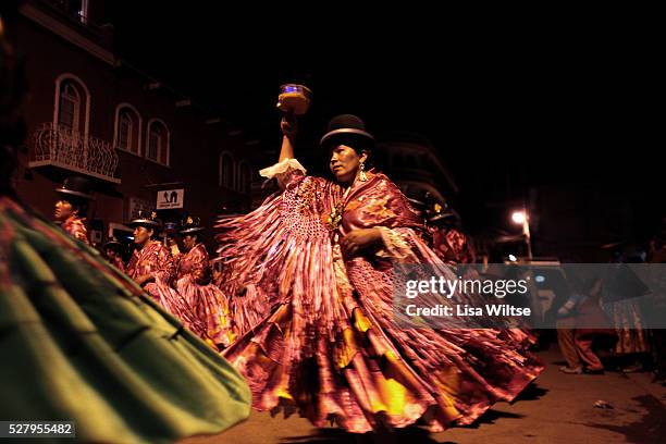 Virgen del la Candelaria Aymaran women dance into the night during the Fiesta de la Virgen de la Candelaria is held to honour the Virgen or the Dark...