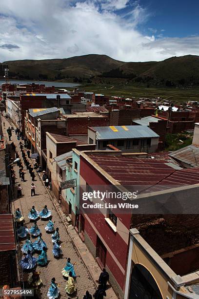 Virgen de la Candelaria View of the parade from a hotel roof. The Fiesta de la Virgen de la Candelaria is held to honour the Virgen or the Dark...