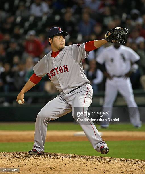 Junichi Tazawa of the Boston Red Sox pitches in the 8th inning against the Chicago White Sox at U.S. Cellular Field on May 3, 2016 in Chicago,...
