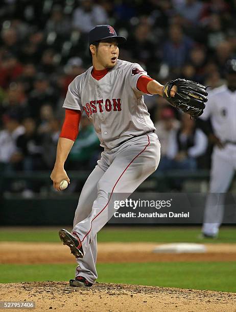 Junichi Tazawa of the Boston Red Sox pitches in the 8th inning against the Chicago White Sox at U.S. Cellular Field on May 3, 2016 in Chicago,...