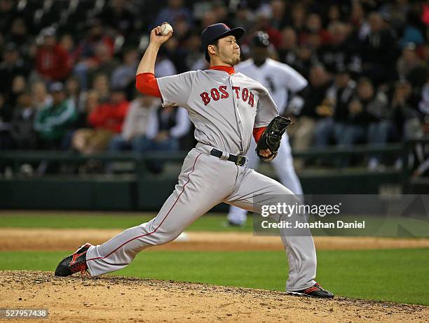 Junichi Tazawa of the Boston Red Sox pitches in the 8th inning against the Chicago White Sox at U.S. Cellular Field on May 3, 2016 in Chicago,...