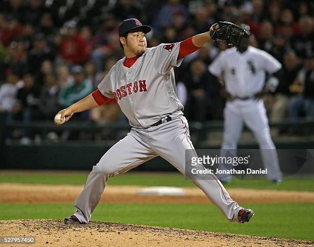 Junichi Tazawa of the Boston Red Sox pitches in the 8th inning against the Chicago White Sox at U.S. Cellular Field on May 3, 2016 in Chicago,...