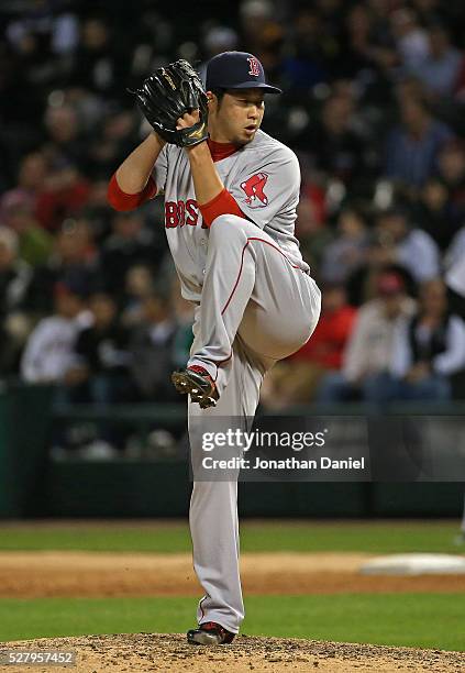 Junichi Tazawa of the Boston Red Sox pitches in the 8th inning against the Chicago White Sox at U.S. Cellular Field on May 3, 2016 in Chicago,...