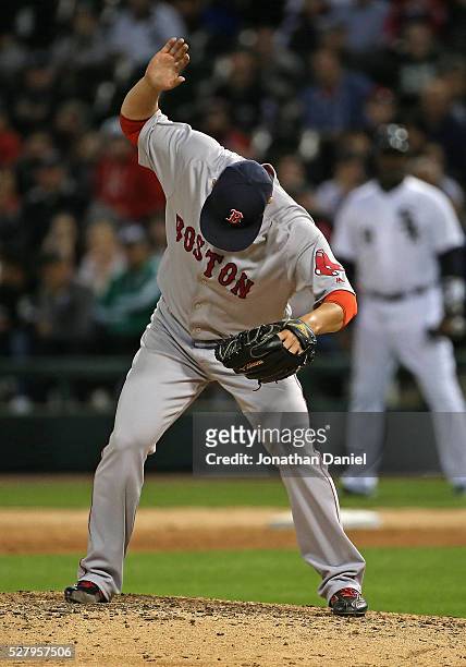 Junichi Tazawa of the Boston Red Sox prepares to pitch in the 8th inning against the Chicago White Sox at U.S. Cellular Field on May 3, 2016 in...
