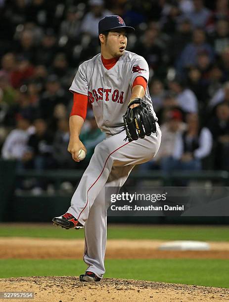 Junichi Tazawa of the Boston Red Sox pitches in the 8th inning against the Chicago White Sox at U.S. Cellular Field on May 3, 2016 in Chicago,...