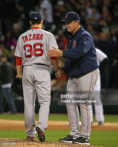 Manager John Farrell of the Boston Red Sox takes Junichi Tazawa out of the game in the 8th inning against the Chicago White Sox at U.S. Cellular...