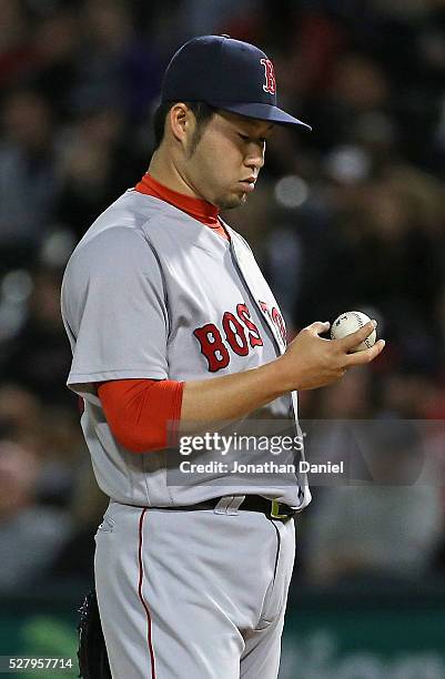 Junichi Tazawa of the Boston Red Sox prepares to pitch in the 8th inning against the Chicago White Sox at U.S. Cellular Field on May 3, 2016 in...