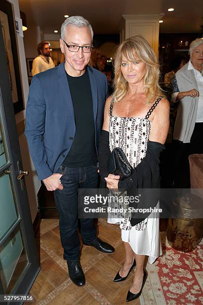 Dr. Drew Pinsky and honoree Goldie Hawn attend Russell Simmons' Rush Philanthropic Arts Foundation's inaugural Art For Life Los Angeles at Private...