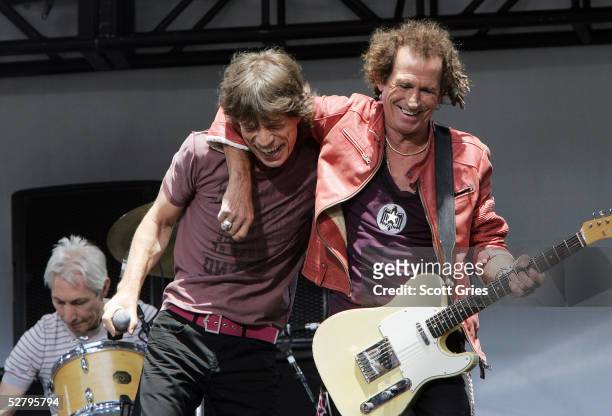 Keith Richards and Mick Jagger of The Rolling Stones perform onstage during a press conference to announce a world tour at the Julliard Music School...