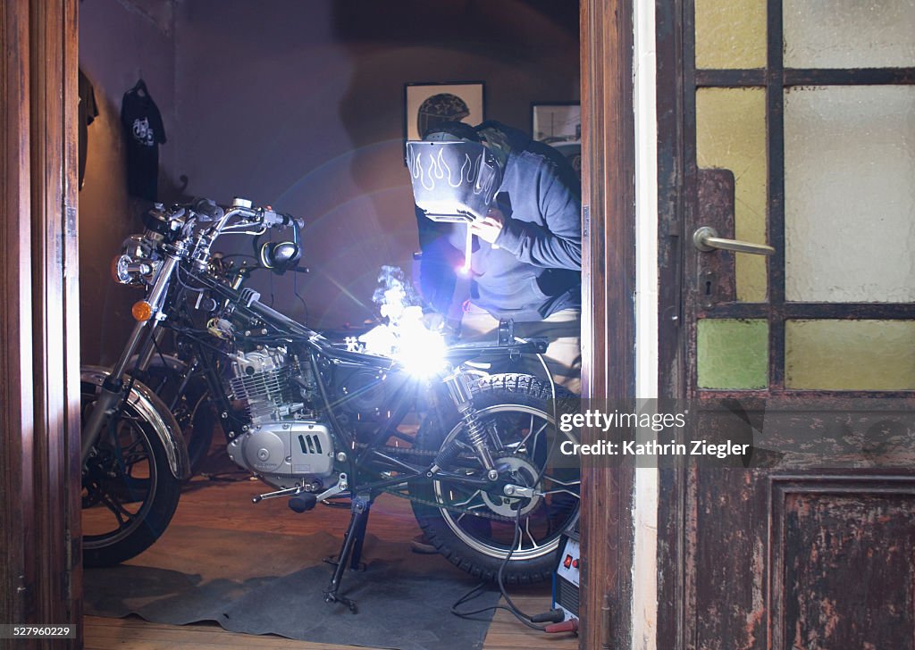 Motorcycle mechanic welding