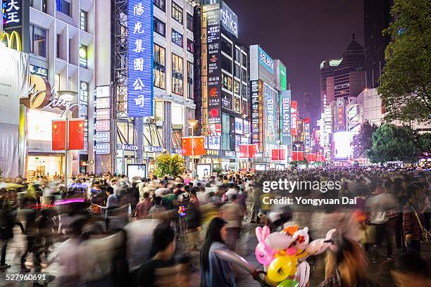 nanjing road at night - people shanghai stock pictures, royalty-free photos & images