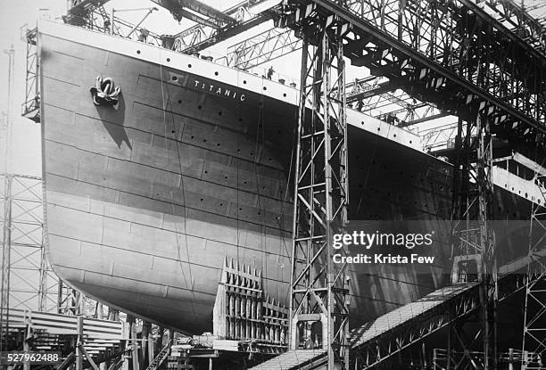 The prow of the Titanic under construction at Harland and Wolff shipyard in Belfast, Ireland. The RMS Titanic hit an iceberg and sank on her maiden...