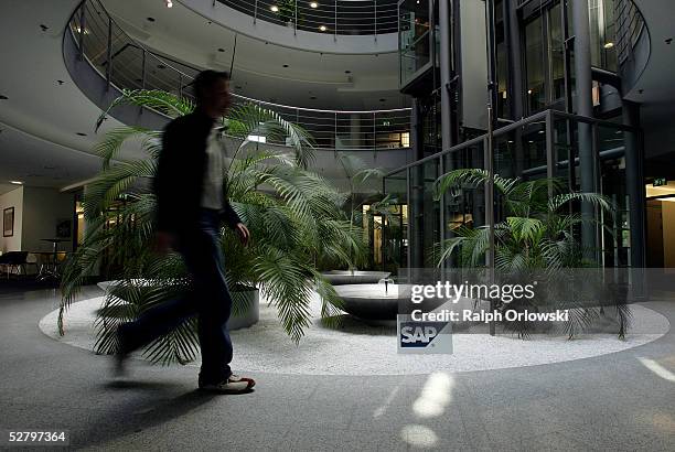 An employee of German software giant SAP walks through the companies headquarter on May 11, 2005 in Mannheim, Germany. SAP will hold their general...