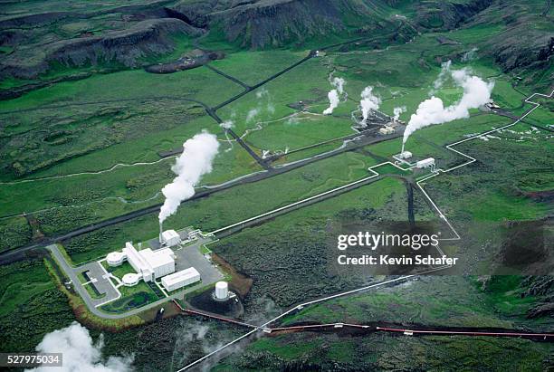 aerial view of geothermal power plant - geothermische centrale stockfoto's en -beelden